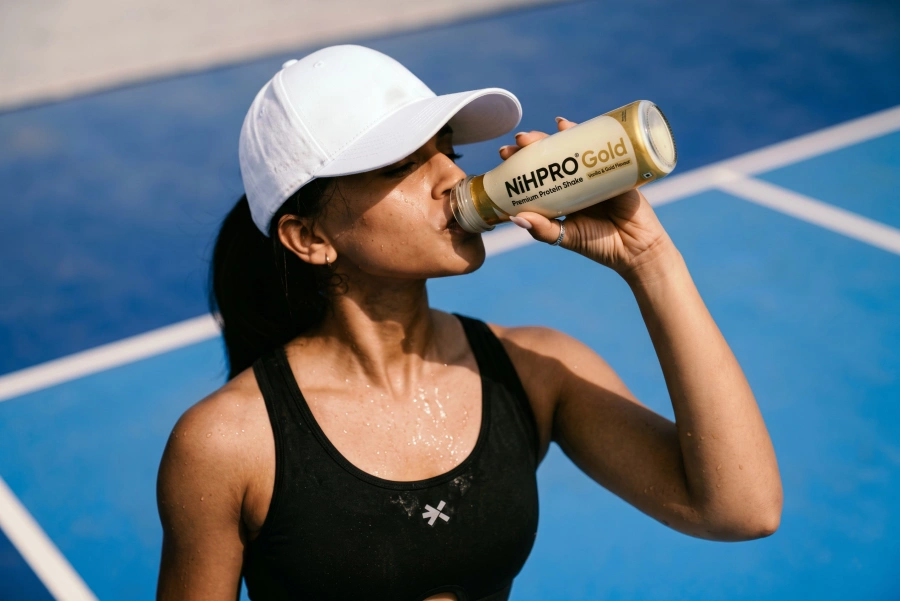 Drew Campbell tasting a NiHPRO®Gold protein shake during sensory evaluation testing